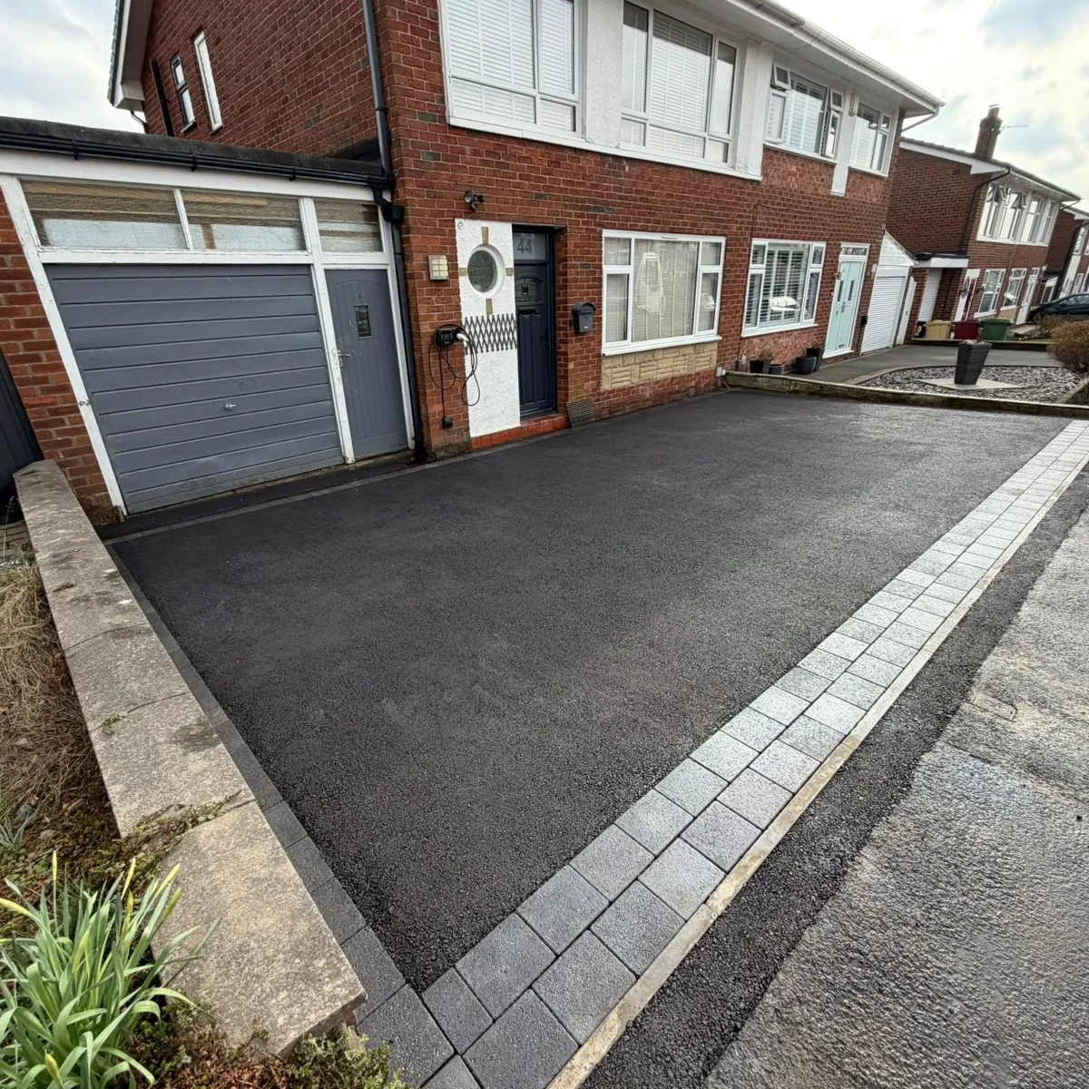 Tarmac driveway with a block border
