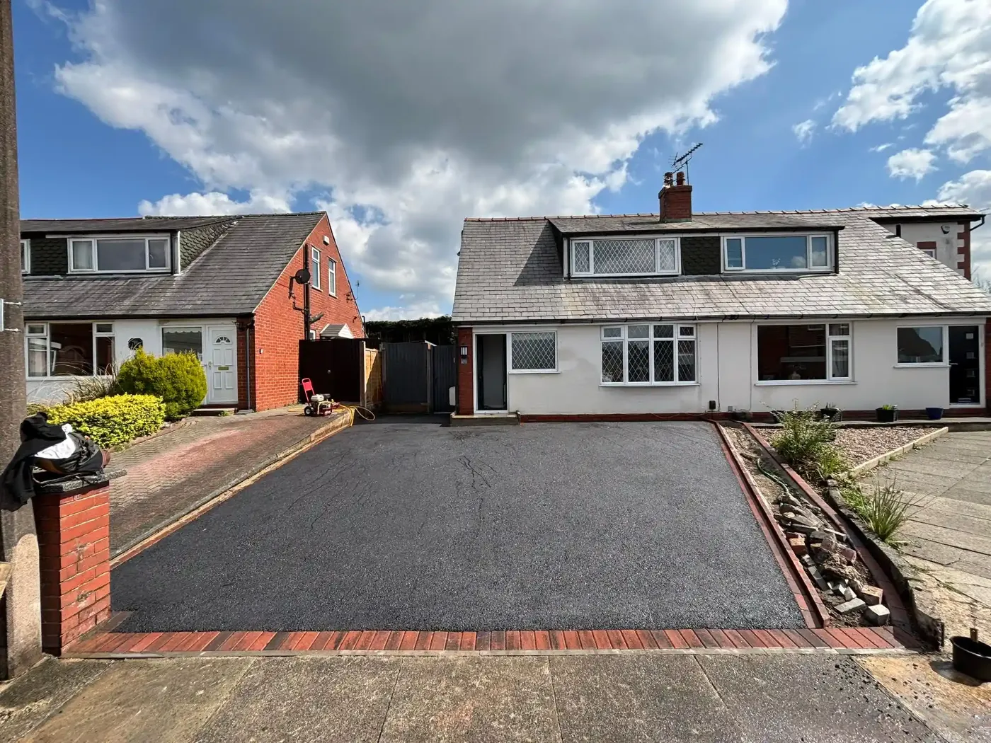 Tarmac driveway with a block border